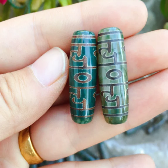 Бусина Дзи "Рождённый лотосом" со шнурком