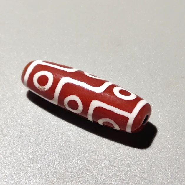 Бусина Дзи 9 глаз "Девять жизненных благ" со шнурком, красная