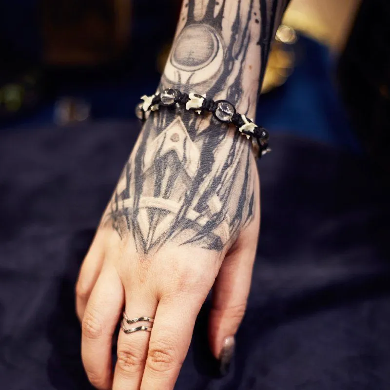 Браслет "Ясность" со змеиными позвонками и горным хрусталем