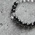Браслет из гематита и горного хрусталя с трикселем