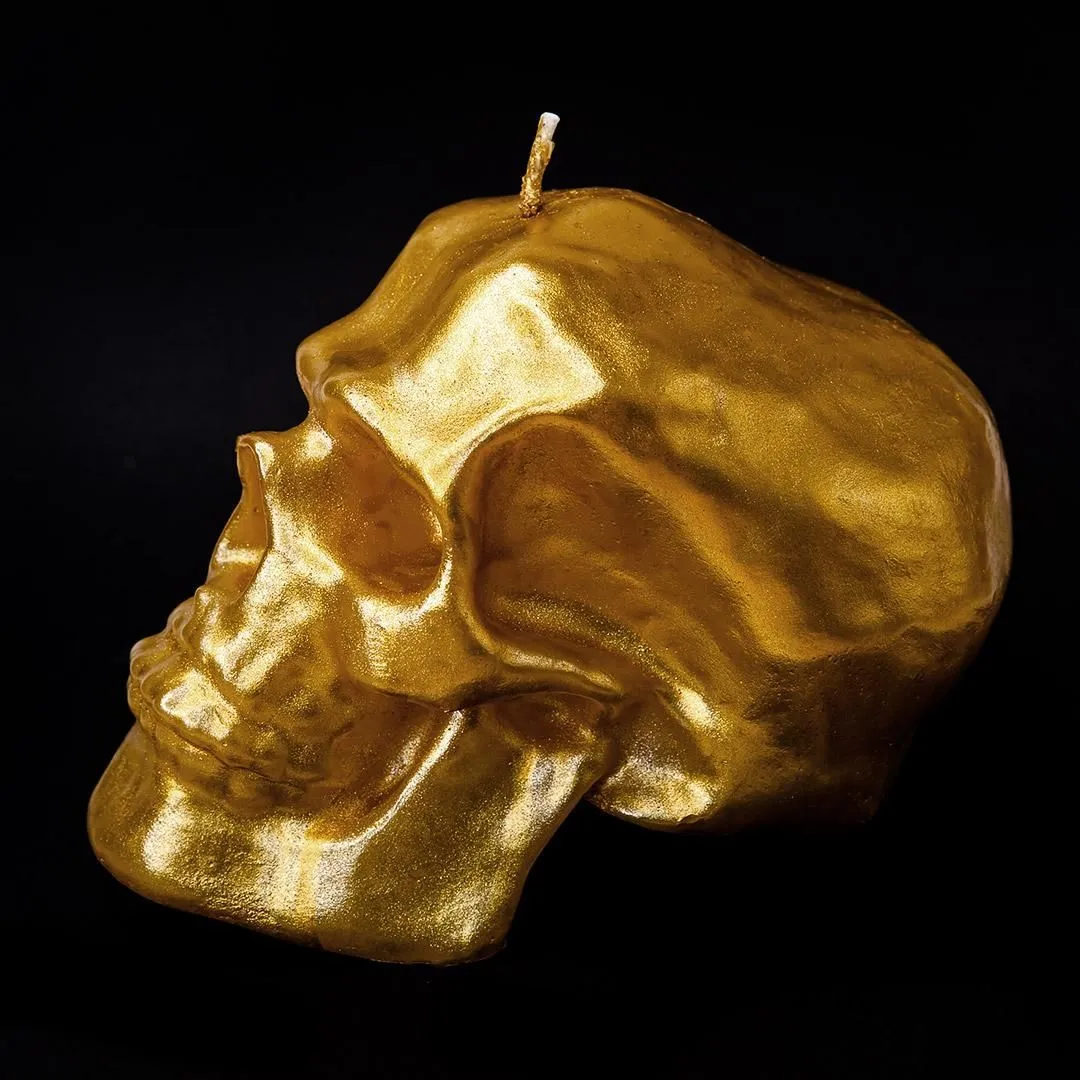 Свеча парафиновая "Череп" золотая